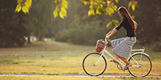 Girl Ridding the bicycle